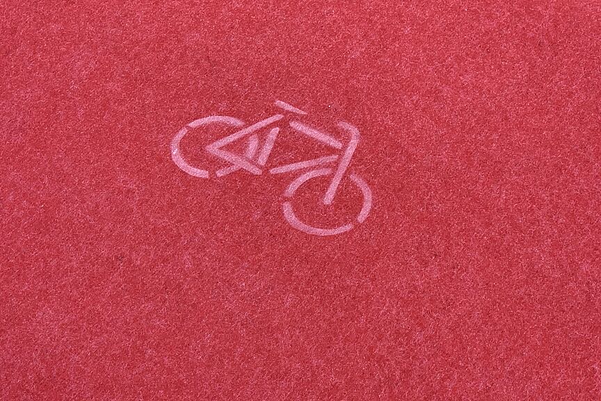Fahrradsymbol Roter Teppich mit Fahrradsymbol